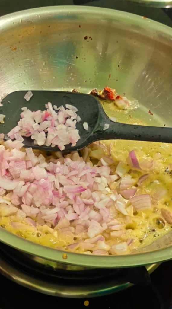 Finely chopped onions added to the oil and whole spices