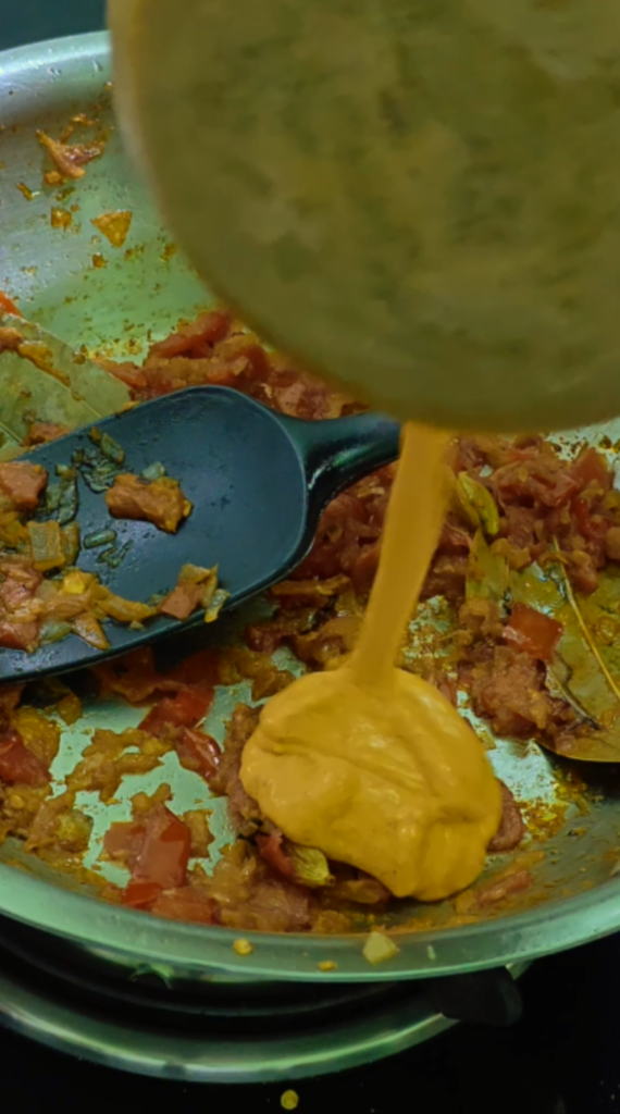 Yogurt topped with turmeric, chilli, cumin, and coriander powders
