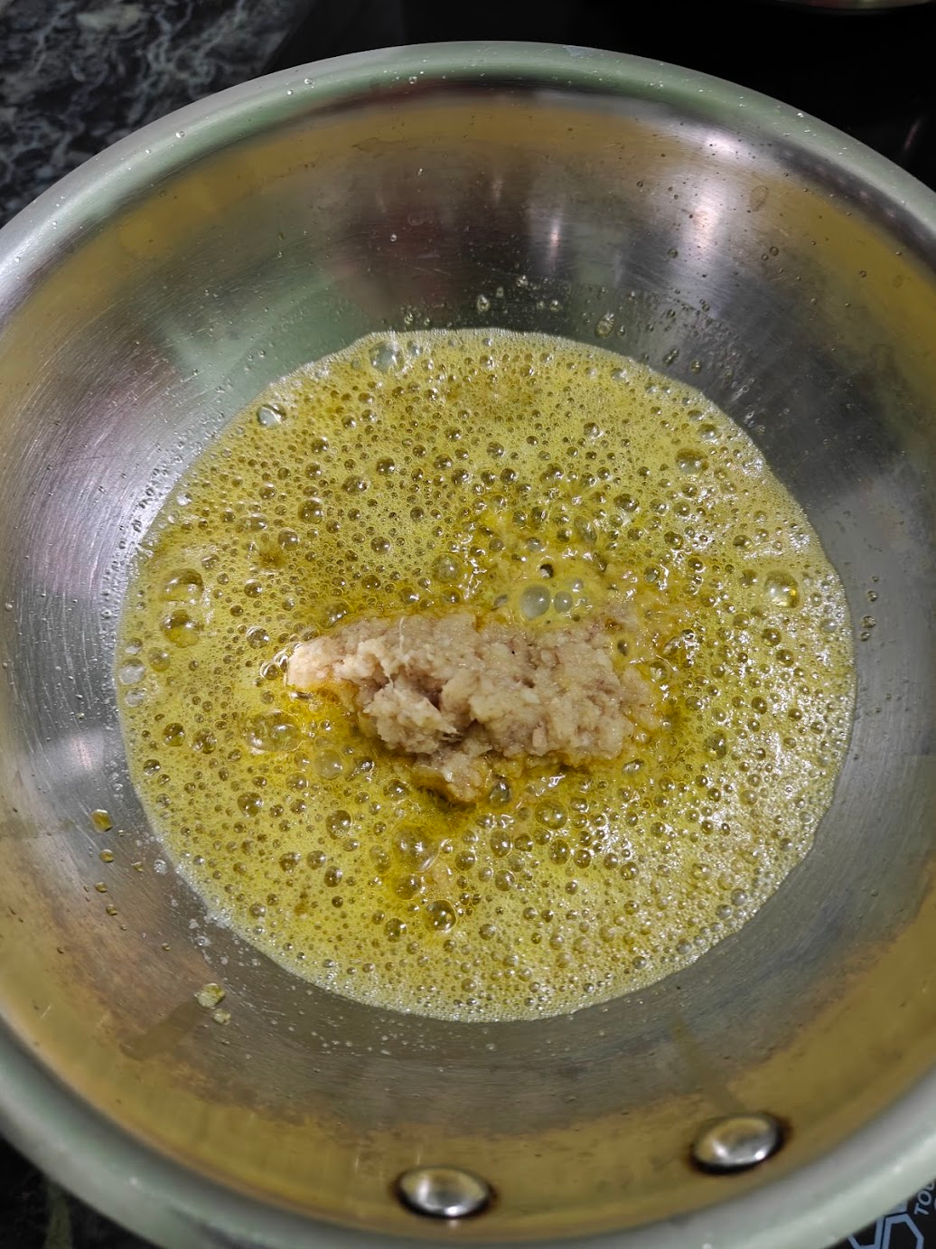 Ginger garlic paste frying in hot oil and butter