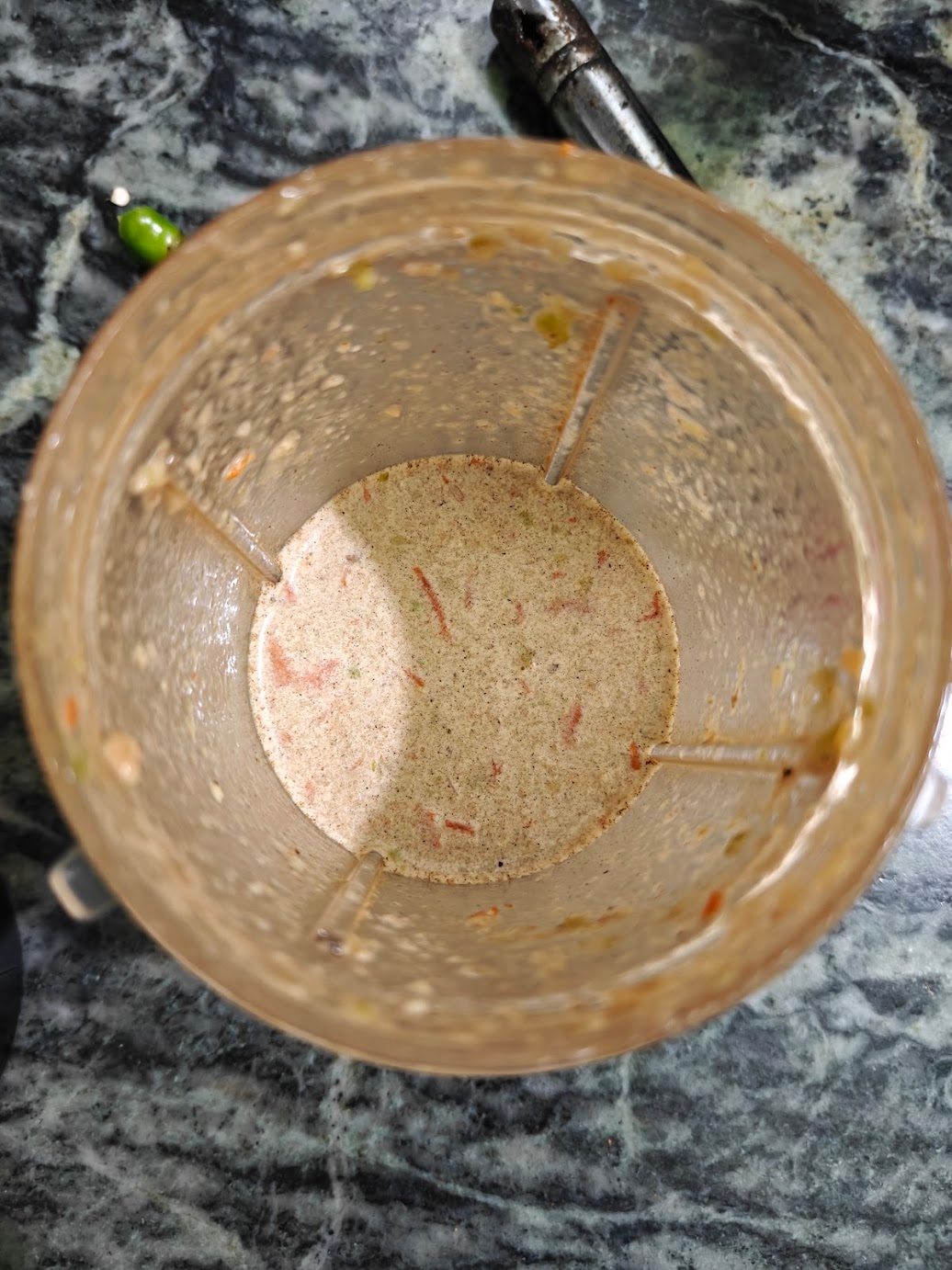 Blended vegetable paste added back to the sautéed vegetables in the pan